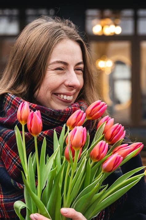 Close-up, Bouquet of Pink Tulips in Female Hands, Urban Portrait. Stock Image - Image of girl ...