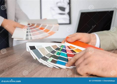 Team Of Designers Working With Color Palettes Stock Photo Image Of