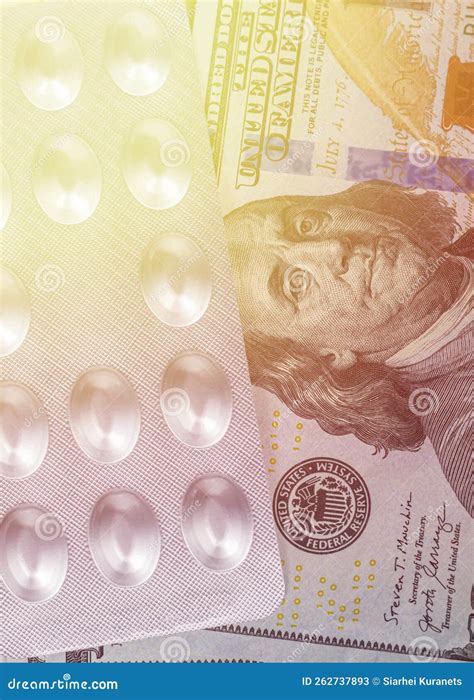 Us Dollars With Pills Tablets Packed In Foil The Concept Of Health