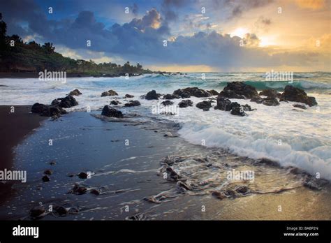 Dramatic sunrise over Hana Bay on the northeast coast of Maui, Hawaii ...