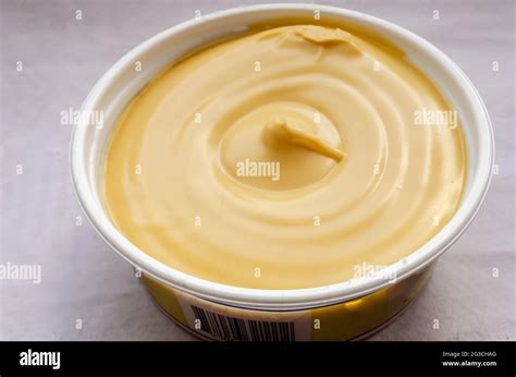 Tub Of Soft Margarine Stock Photo Alamy