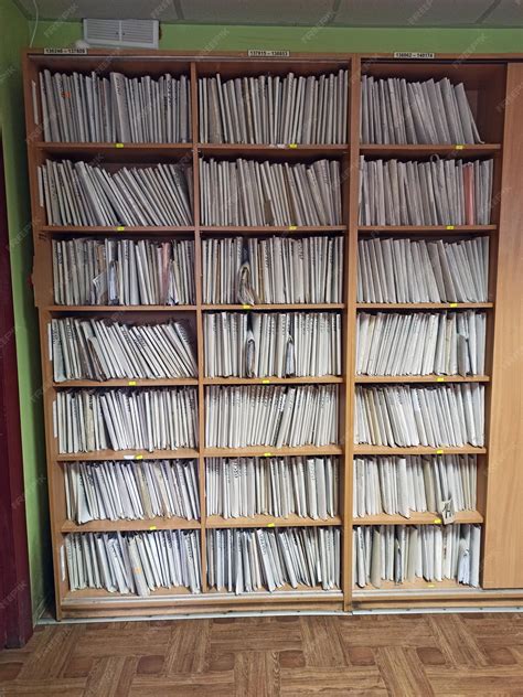 Shelf with archival documents lots of papers pile of archive papers