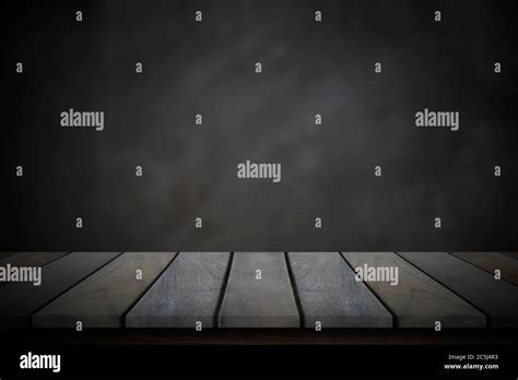 Empty Wood Table Top Over Blur Blackboard Background Stock Photo Alamy