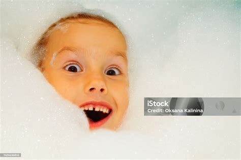 Little Sweet Girl Takes Bath With Bath Foam Funny Expression Joy On