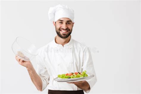 Imagem Do Homem Chefe Uniforme De Cozinheira Sorrindo E Segurando