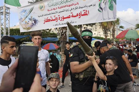 In first, Hamas encourages Gazans, including children, to pose with its ...