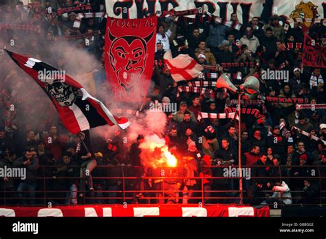 AC Milan fans soak up the atmosphere prior to the game Stock Photo - Alamy