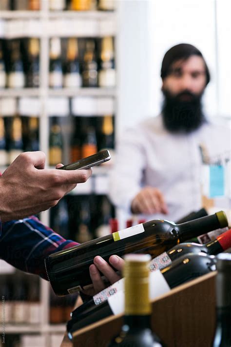 "Wine: Man Takes Photo Of Wine Label" by Stocksy Contributor "Sean ...