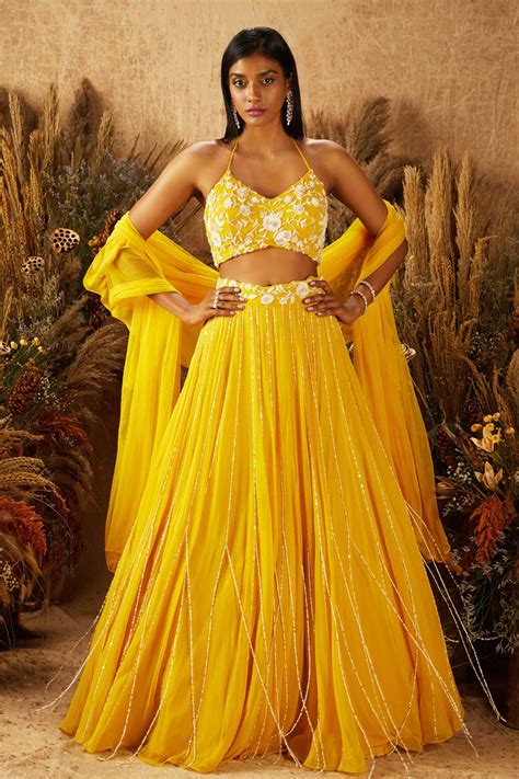 Buy Yellow Net Embroidery Halter Lehenga Set For Women By Shloka