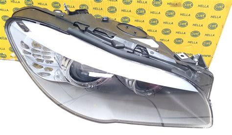 LAMPA REFLEKTOR PRAWY HELLA BI KSENON BMW 5 F10 5 F11 2009 1EL 010 131