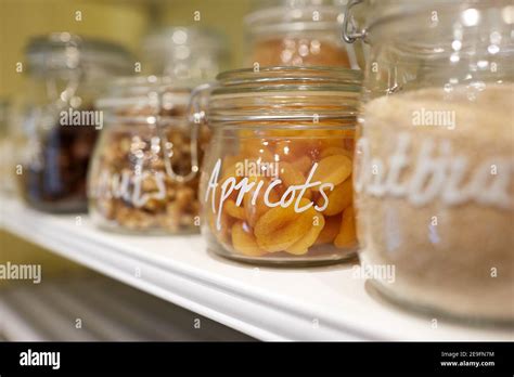 Photograph Of Dried Fruit Nuts And Seeds In Glass Jars Stock Photo Alamy