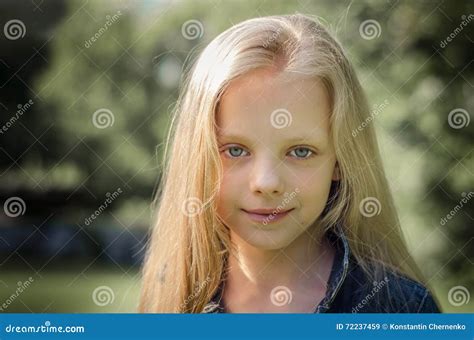 Portrait Of A Beautiful Blonde Little Girl With Long Hair. Stock Image | CartoonDealer.com #72237511