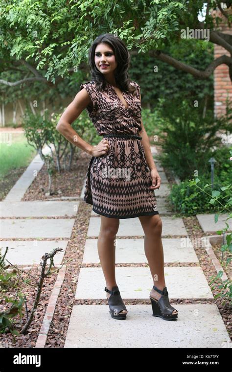 Brunette Woman Wearing A Patterned Mini Dress Stock Photo Alamy