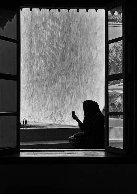 Premium Photo Rear View Of Woman Looking Through Window