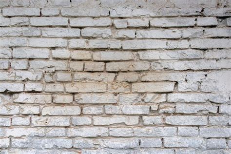 Premium Photo Texture Of A Weathered White Brick Wall