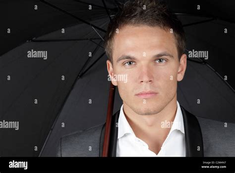 Black Suit With Umbrella Hi Res Stock Photography And Images Alamy