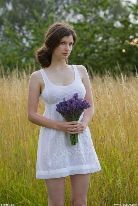 Long Legged German Babe Susann Displays Her Firm Boobs While Posing Nude In The Field By Femjoy