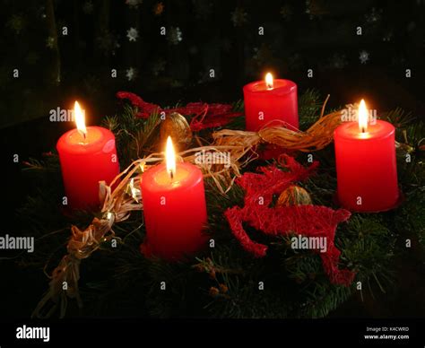 Advent Wreath With Four Burning Candles, Candlelight On The Fourth ...