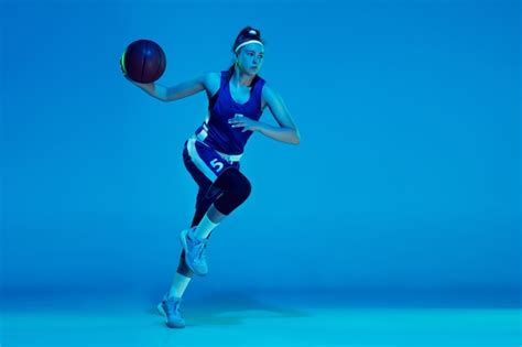 Free Photo | Young caucasian female basketball player isolated on blue ...