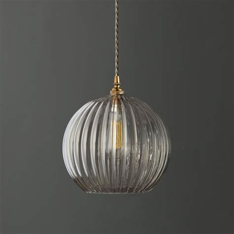 Larger Pumpkin In Clear Glass With Classic Pendant Light Kit In Antiqued Brass Pendant Lights