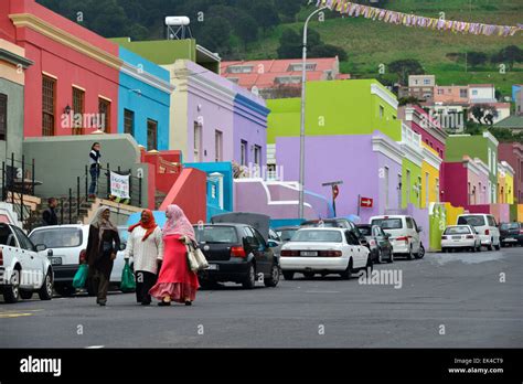 Cape Malay ladies from the Malay Qurter in Bo Kaap walking down Wale street towards Cape Town ...