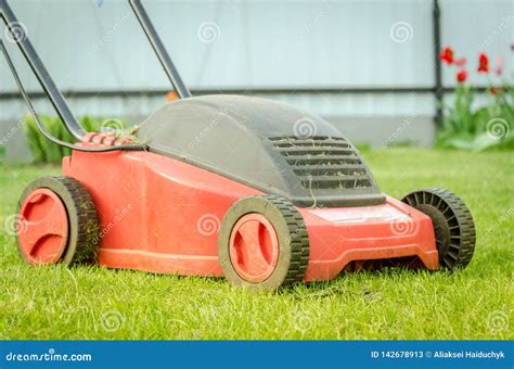 Lawn Mower On The Tonsured Lawn Red Lawn Mower On The Tonsured Lawn