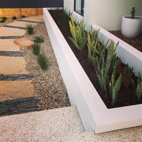 Rendered Brick Raised Garden Beds With Stone Feature Path Modern