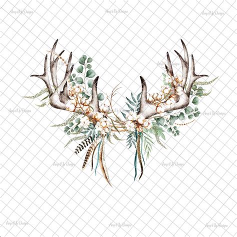 Deer Antlers With Flowers And Greenery On Their Horns Are Shown In This