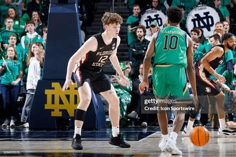 Florida State Seminoles Guard Tom House Defends During A College