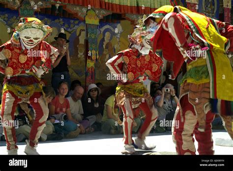 Cham dance - traditional tibetan buddhist monks dance in masks and costumes, Thiksey Tikce ...