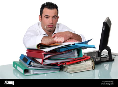 An Overworked Office Worker Stock Photo Alamy