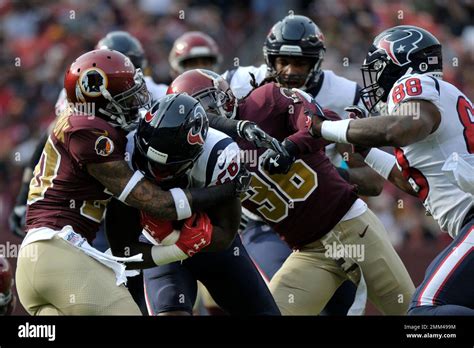 Houston Texans Running Back Alfred Blue Center Is Tackled By