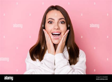 Photo Of Shiny Impressed Young Lady Wear White Hoodie Smiling Arms