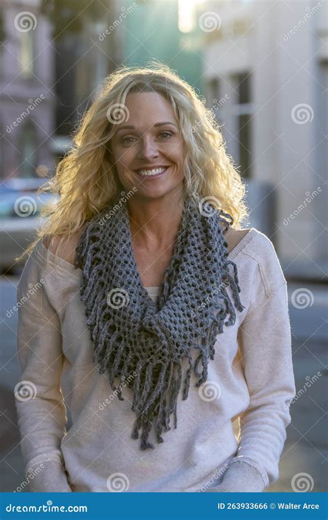 Lovely Blonde Mature Model Posing Outdoors In An Urban Environment Stock Photo Image Of