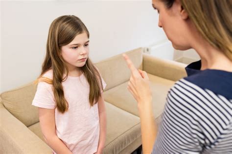 Free Photo Mother Scolding Her Daughter In Living Room