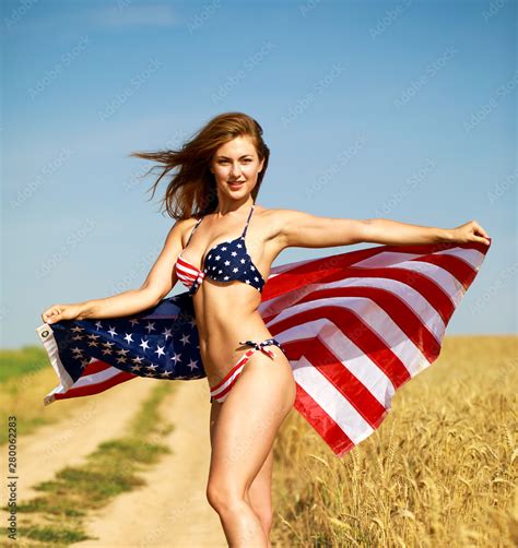 Sexy Woman In Sexy American Flag Bikini In A Wheat Field Stock Foto