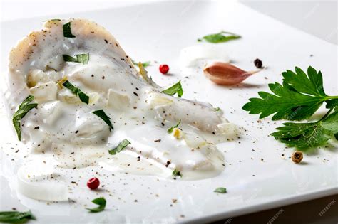 Premium Photo Marinated Fish With Herbs