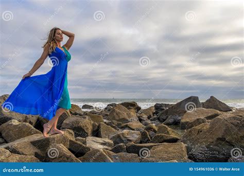 Lovely Brunette Latin Model Poses Outdoors On A Beach At Sunset Stock Photo Image Of Adult