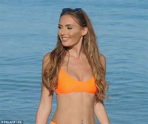 Survival Of The Fittest S Georgie Clarke Sizzles In Orange Bikini