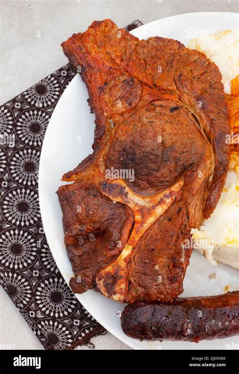 Flat Lay Of Traditional South African Braai Or Shisa Nyama Meat Cooked