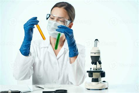 Female Laboratory Assistant Wearing Yellow Glasses Chemical Solution