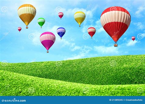 Hot Air Balloons Floating Over Green Field Stock Image Image Of