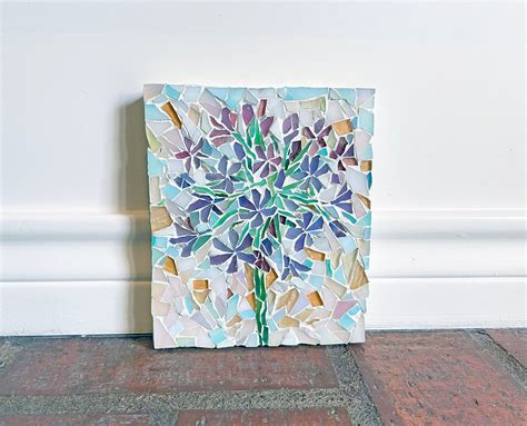 A Purple Agapanthus African Lily In Ivory Blue Background Stained Glass