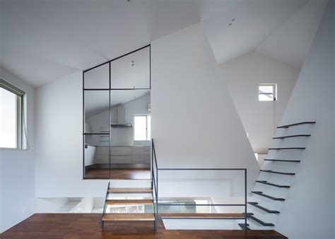 House In Japan By Spray Shelters Patios Beneath Its Wonky Roof