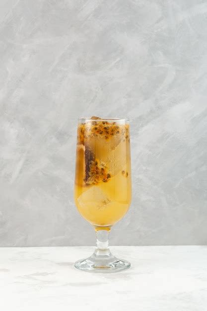 Premium Photo Iced Yuzu Drink With Passion Fruit And Orange Juice In