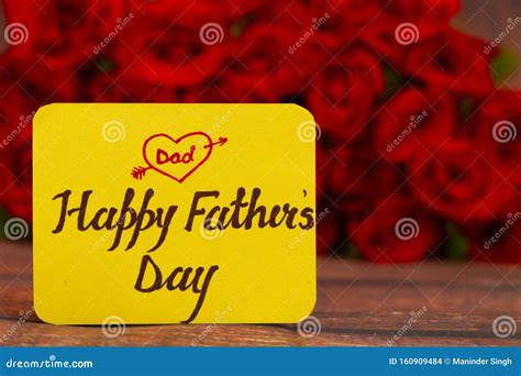 Happy Father`s Day Text With Red Roses In A Bunch As A Background