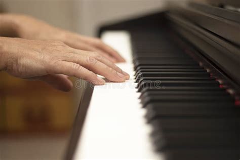 Female Hands Play The Electric Piano Hand And Piano Keys Close Up