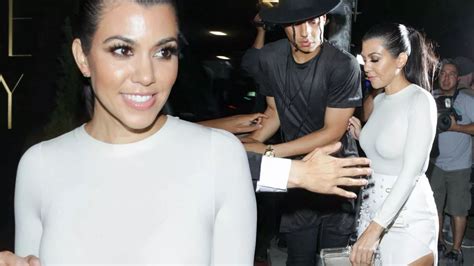 Kourtney Kardashian Shows Off Slender Legs In Sexy Mini Skirt As She