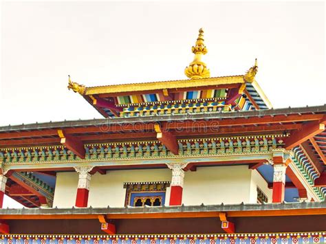 Colorful Details Of The Roof Of A Buddhist Temple Wood Carving Close