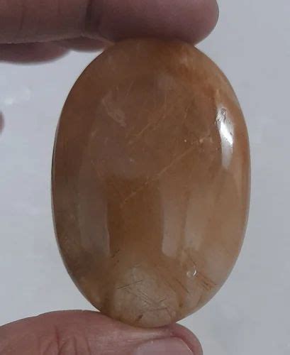 Excellent Golden Rutile Quartz Oval Palmstone For Healing At Rs 1000